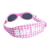 Baby Banz / Kidz Banz solglasögon för barn och baby. Rutigt mönster i rosa och vitt.